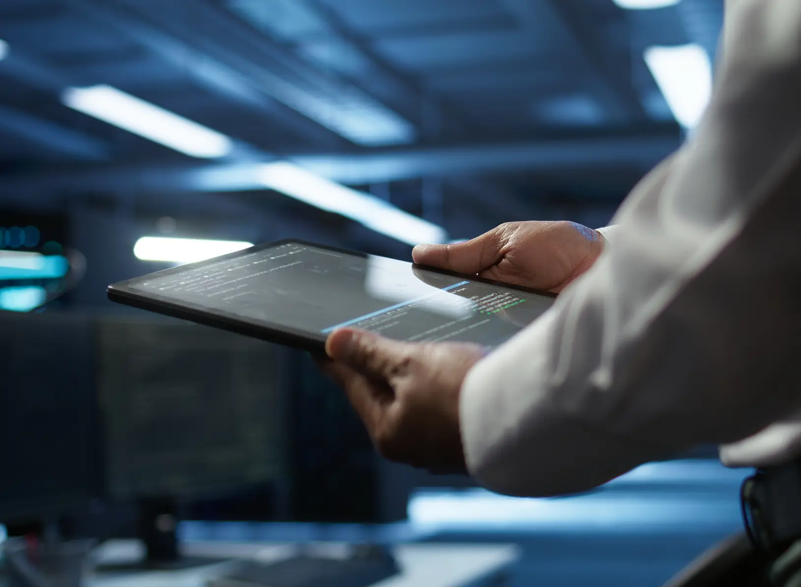 team of diverse multiethnic software developers working on computers sitting together in one